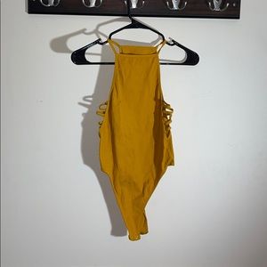 Women’s mustard yellow body suit